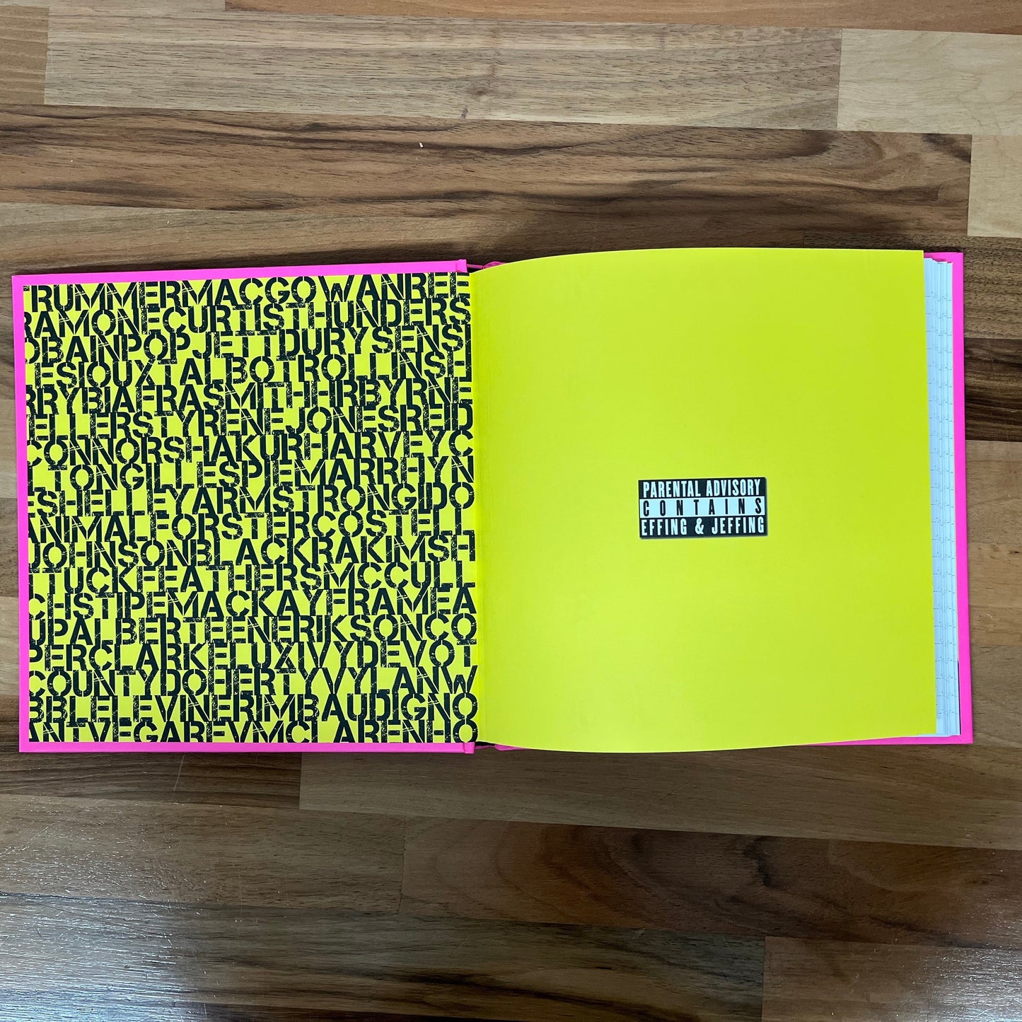 Two colorful notebooks with patterns on a wooden surface