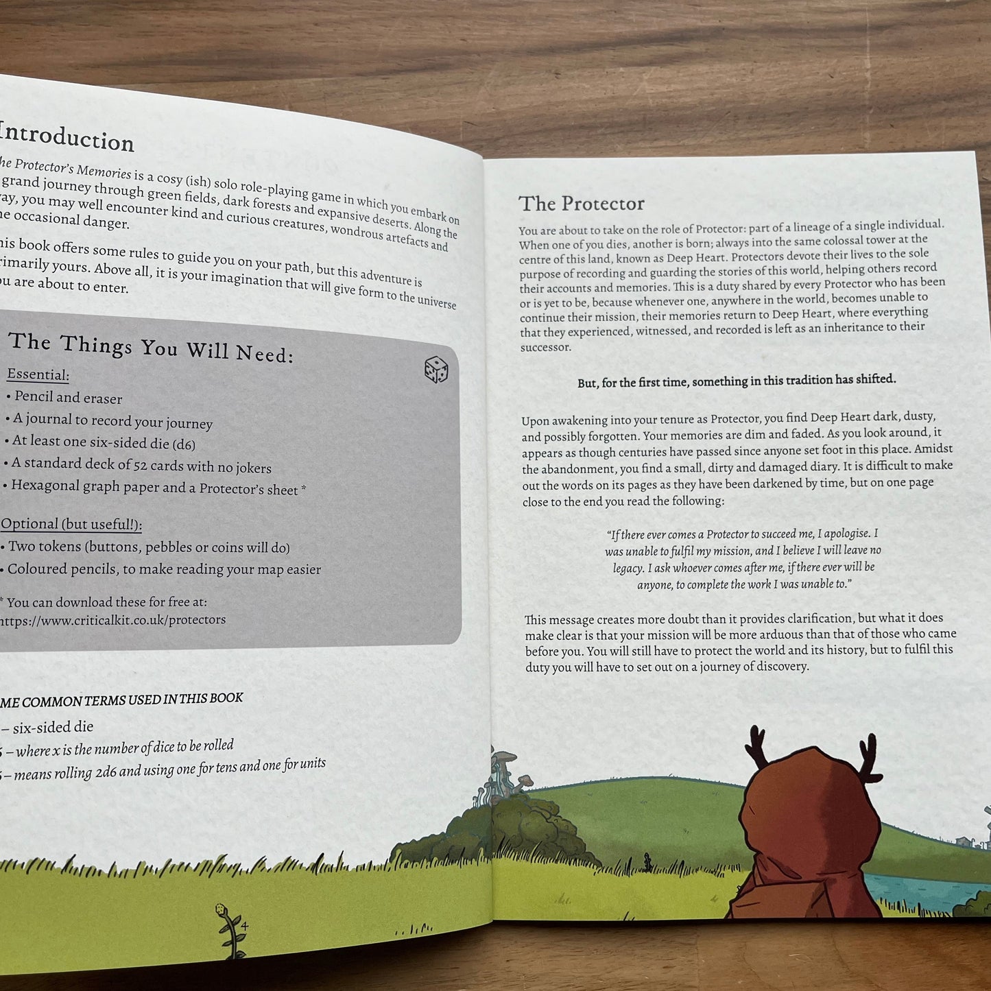Open book with text and illustrations on a wooden surface