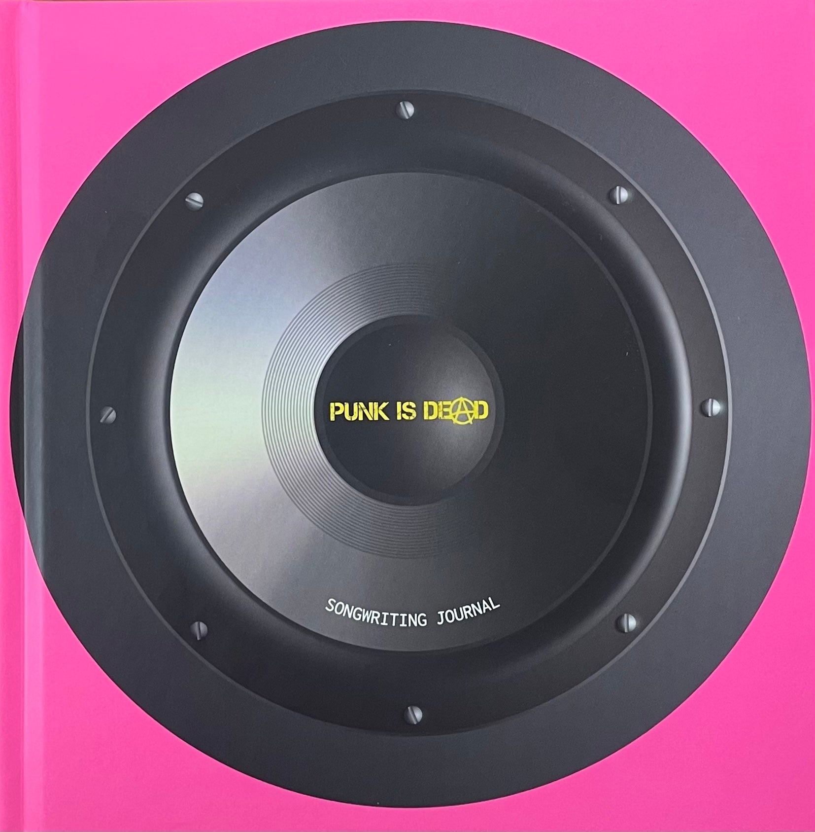 Book cover with a black circular design and 'Punk is Dead' text on a pink background