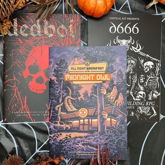 halloween decorations surrounding three rpg books dedboi, all night breakfast and d666 for spooky solo journaling game
