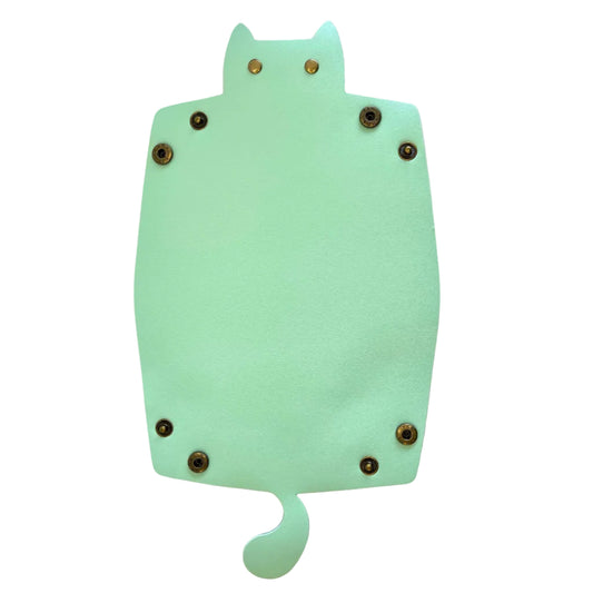 A mint green cat-shaped dice tray with six metal studs, shown on a plain white background.