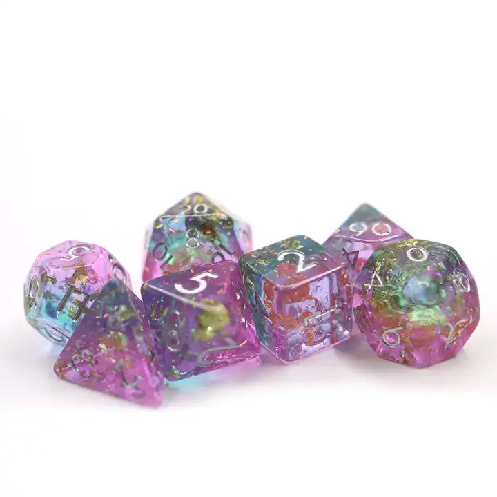 GLITTER dnd TTRPG dice set from a UK dice store, role playing games for dice goblin collectors of click clacks and shiny math rocks