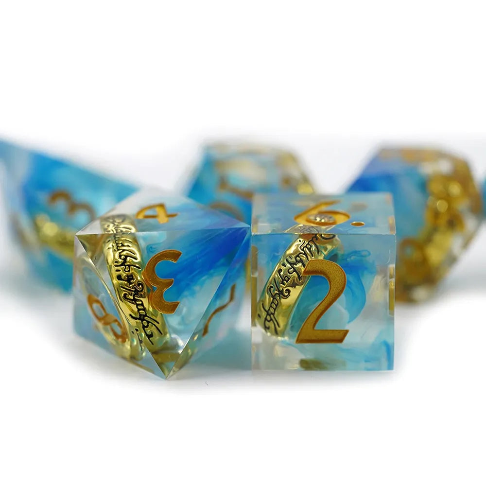 Precious gold ring with inscription, emerald and white clouds sharp edge dice for dnd, RPG, critical critters, dice goblin and dice dragon collectors