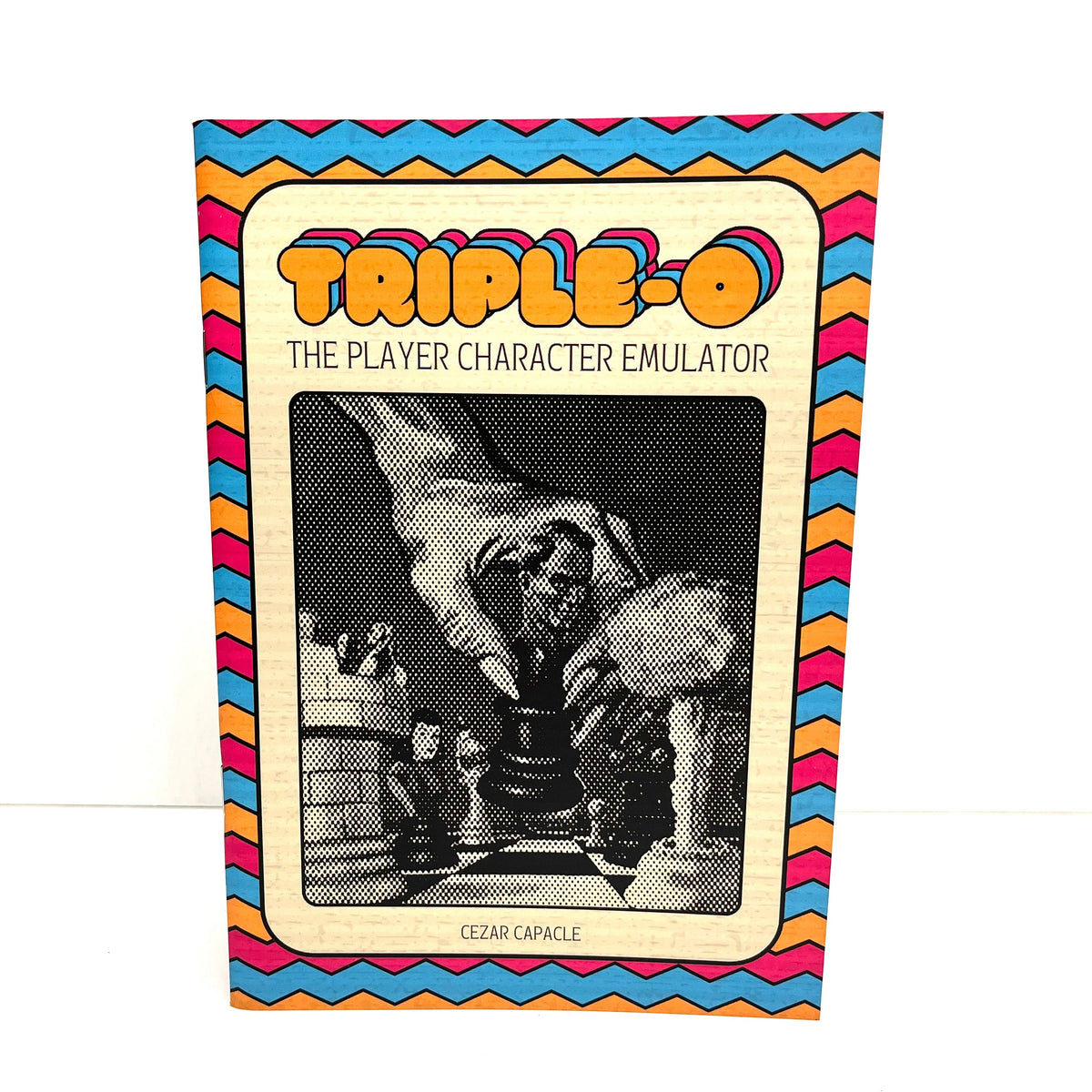 The book cover of 'Triple-o: The Player Character Emulator' by Cezar Capacle, featuring a retro design with a colorful zigzag border and a black-and-white illustration of a hand holding a mug.