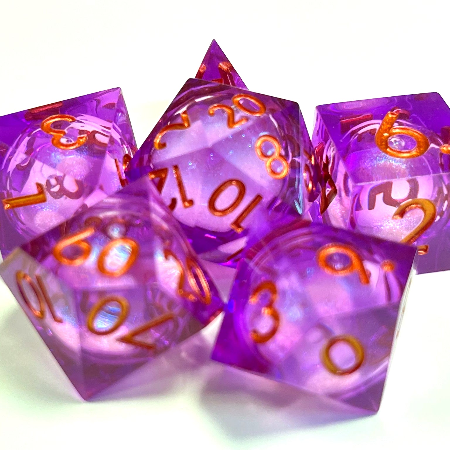 Cherry Bomb TTRPG liquid core sharp edge dice set for role playing games and dice goblins