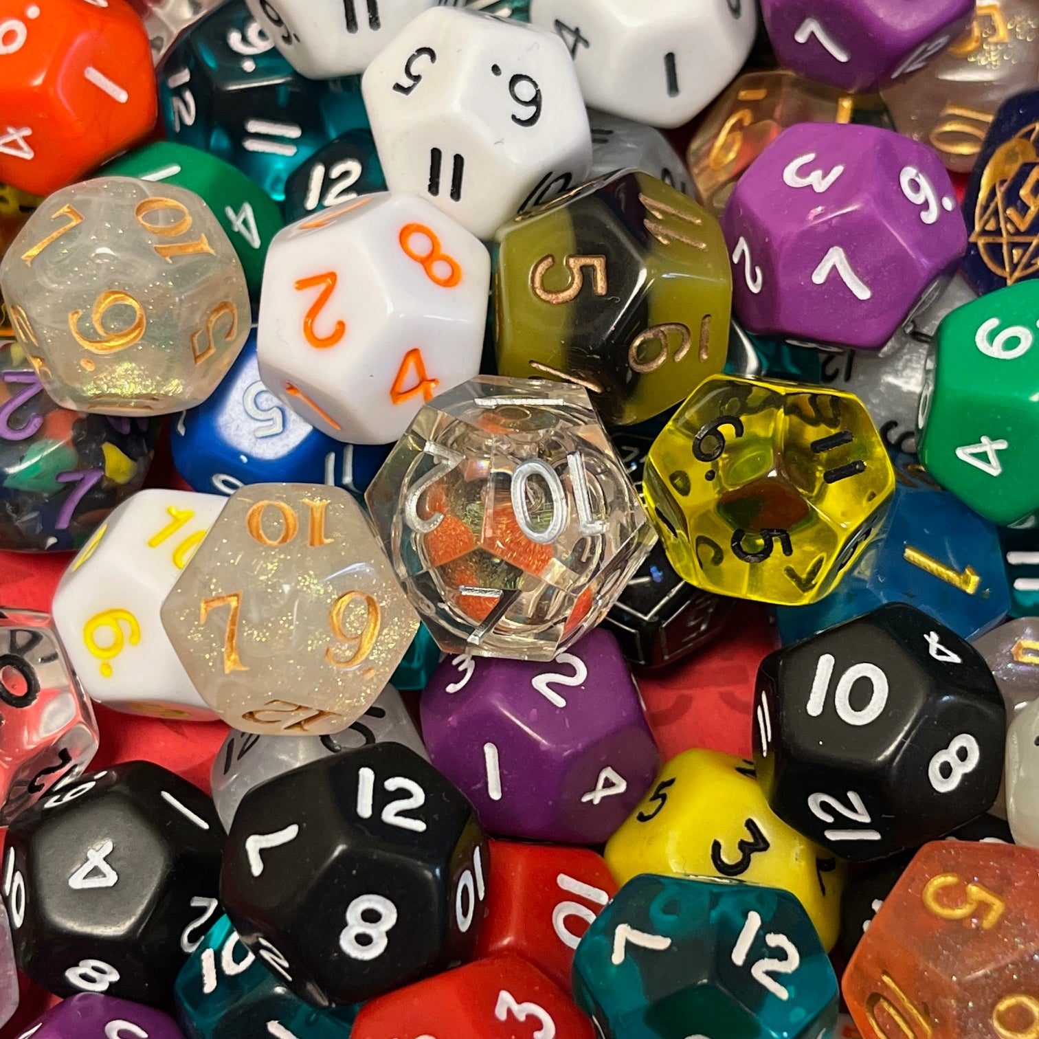 Random D12 TTRPG dice sets for DND and role playing games and dice goblin collectors