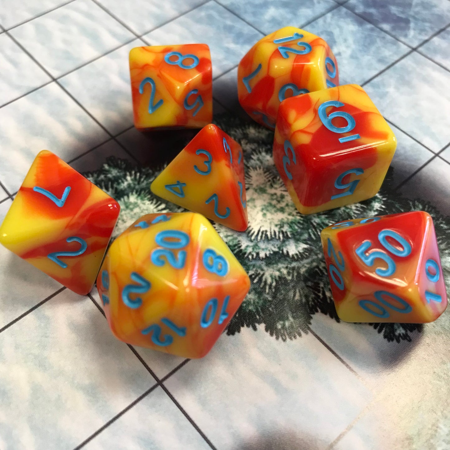 Rising Phoenix TTRPG/DND dice set for dice goblins and role playing games from a UK DND store